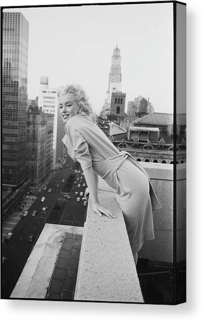 Marilyn On The Roof Canvas Art Print by Michael Ochs Archives