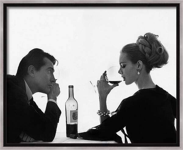 Man Gazing At Woman Sipping Wine Framed Canvas Print