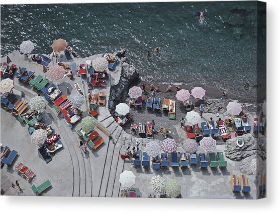 Positano Beach Canvas Art Print by Slim Aarons